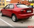 Красный Дэу Ланос, объемом двигателя 1.5 л и пробегом 260 тыс. км за 1999 $, фото 3 на Automoto.ua