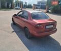 Красный Дэу Ланос, объемом двигателя 1.5 л и пробегом 270 тыс. км за 2100 $, фото 6 на Automoto.ua