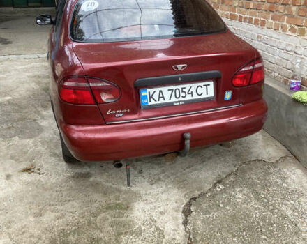 Червоний Деу Ланос, об'ємом двигуна 1.6 л та пробігом 257 тис. км за 1200 $, фото 2 на Automoto.ua