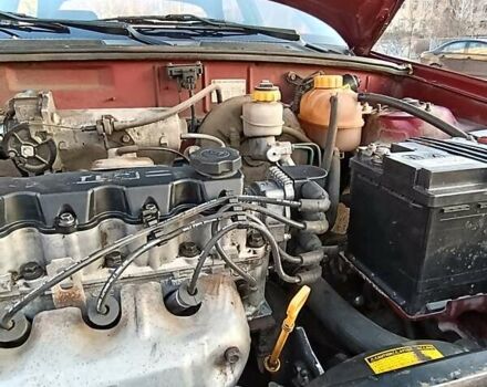 Красный Дэу Ланос, объемом двигателя 1.5 л и пробегом 103 тыс. км за 3000 $, фото 3 на Automoto.ua