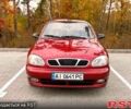 Красный Дэу Ланос, объемом двигателя 1.5 л и пробегом 260 тыс. км за 1999 $, фото 1 на Automoto.ua