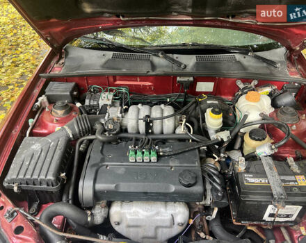 Червоний Деу Ланос, об'ємом двигуна 1.6 л та пробігом 250 тис. км за 2600 $, фото 6 на Automoto.ua