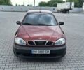 Красный Дэу Ланос, объемом двигателя 1.5 л и пробегом 150 тыс. км за 1250 $, фото 1 на Automoto.ua