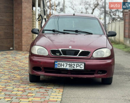 Красный Дэу Ланос, объемом двигателя 1.5 л и пробегом 270 тыс. км за 1400 $, фото 1 на Automoto.ua