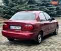 Красный Дэу Ланос, объемом двигателя 1.5 л и пробегом 84 тыс. км за 1800 $, фото 5 на Automoto.ua