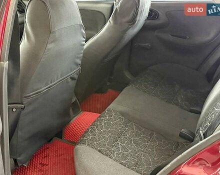 Червоний Деу Ланос, об'ємом двигуна 1.5 л та пробігом 305 тис. км за 2440 $, фото 9 на Automoto.ua