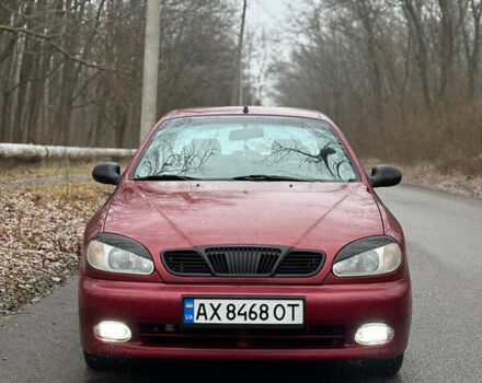 Красный Дэу Ланос, объемом двигателя 1.6 л и пробегом 235 тыс. км за 2150 $, фото 1 на Automoto.ua