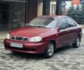Красный Дэу Ланос, объемом двигателя 1.5 л и пробегом 84 тыс. км за 1950 $, фото 1 на Automoto.ua