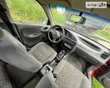 Красный Дэу Ланос, объемом двигателя 1.5 л и пробегом 150 тыс. км за 1250 $, фото 16 на Automoto.ua