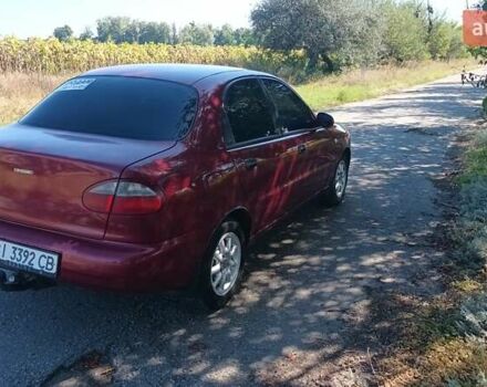 Красный Дэу Ланос, объемом двигателя 1.5 л и пробегом 150 тыс. км за 2650 $, фото 4 на Automoto.ua