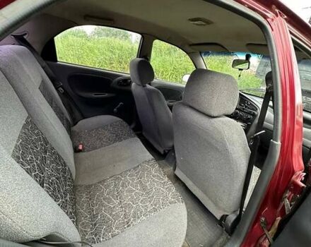 Красный Дэу Ланос, объемом двигателя 1.5 л и пробегом 150 тыс. км за 1250 $, фото 11 на Automoto.ua