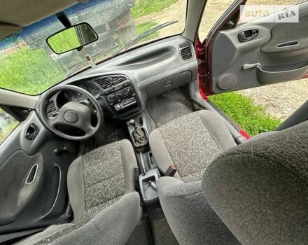 Красный Дэу Ланос, объемом двигателя 1.5 л и пробегом 150 тыс. км за 1250 $, фото 17 на Automoto.ua