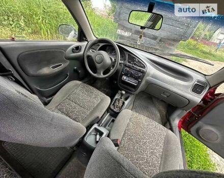 Красный Дэу Ланос, объемом двигателя 1.5 л и пробегом 150 тыс. км за 1250 $, фото 4 на Automoto.ua