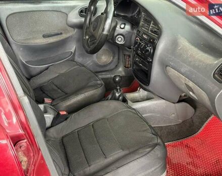 Червоний Деу Ланос, об'ємом двигуна 1.5 л та пробігом 305 тис. км за 2440 $, фото 11 на Automoto.ua