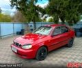 Красный Дэу Ланос, объемом двигателя 1.5 л и пробегом 277 тыс. км за 1750 $, фото 1 на Automoto.ua