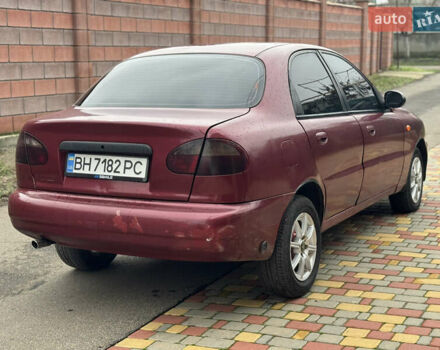 Красный Дэу Ланос, объемом двигателя 1.5 л и пробегом 270 тыс. км за 1400 $, фото 5 на Automoto.ua