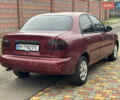 Красный Дэу Ланос, объемом двигателя 1.5 л и пробегом 270 тыс. км за 1400 $, фото 5 на Automoto.ua