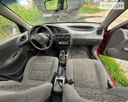 Красный Дэу Ланос, объемом двигателя 1.5 л и пробегом 150 тыс. км за 1250 $, фото 6 на Automoto.ua