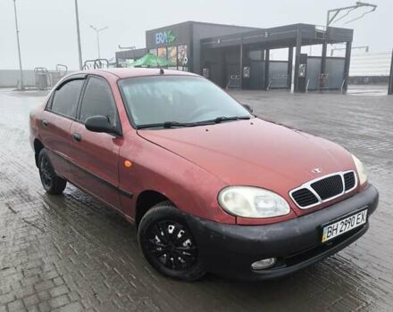 Красный Дэу Ланос, объемом двигателя 1.5 л и пробегом 305 тыс. км за 1800 $, фото 1 на Automoto.ua