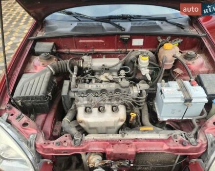 Червоний Деу Ланос, об'ємом двигуна 1.5 л та пробігом 224 тис. км за 1400 $, фото 12 на Automoto.ua