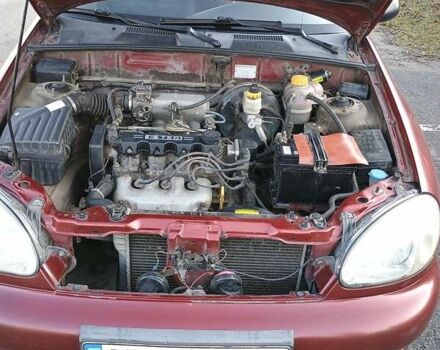 Красный Дэу Ланос, объемом двигателя 1.5 л и пробегом 157 тыс. км за 2750 $, фото 3 на Automoto.ua