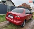Красный Дэу Ланос, объемом двигателя 1.5 л и пробегом 289 тыс. км за 1700 $, фото 4 на Automoto.ua