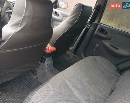 Красный Дэу Ланос, объемом двигателя 1.5 л и пробегом 289 тыс. км за 1700 $, фото 6 на Automoto.ua