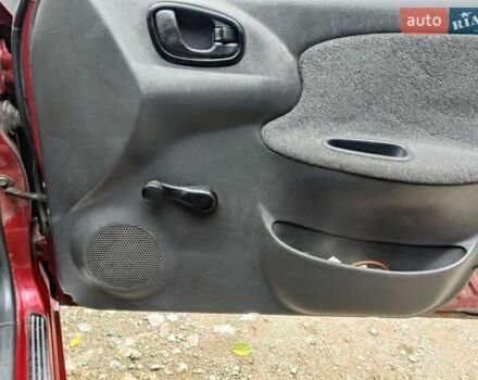 Красный Дэу Ланос, объемом двигателя 1.5 л и пробегом 275 тыс. км за 1700 $, фото 8 на Automoto.ua
