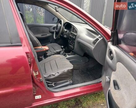 Красный Дэу Ланос, объемом двигателя 1.5 л и пробегом 289 тыс. км за 1700 $, фото 7 на Automoto.ua