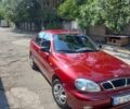 Красный Дэу Ланос, объемом двигателя 1.5 л и пробегом 123 тыс. км за 3100 $, фото 2 на Automoto.ua