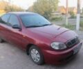 Красный Дэу Ланос, объемом двигателя 1.5 л и пробегом 132 тыс. км за 3500 $, фото 1 на Automoto.ua