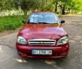 Красный Дэу Ланос, объемом двигателя 1.5 л и пробегом 250 тыс. км за 2900 $, фото 1 на Automoto.ua