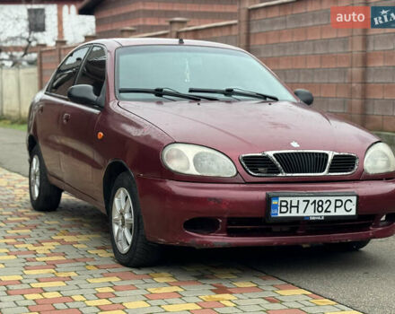 Красный Дэу Ланос, объемом двигателя 1.5 л и пробегом 270 тыс. км за 1400 $, фото 2 на Automoto.ua