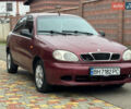 Красный Дэу Ланос, объемом двигателя 1.5 л и пробегом 270 тыс. км за 1400 $, фото 2 на Automoto.ua