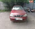 Красный Дэу Ланос, объемом двигателя 1.5 л и пробегом 250 тыс. км за 700 $, фото 1 на Automoto.ua