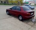 Красный Дэу Ланос, объемом двигателя 1.5 л и пробегом 200 тыс. км за 1950 $, фото 5 на Automoto.ua