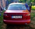 Красный Дэу Ланос, объемом двигателя 1.4 л и пробегом 250 тыс. км за 2500 $, фото 3 на Automoto.ua