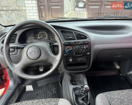 Красный Дэу Ланос, объемом двигателя 1.4 л и пробегом 44 тыс. км за 3300 $, фото 12 на Automoto.ua