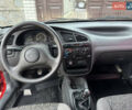 Красный Дэу Ланос, объемом двигателя 1.4 л и пробегом 44 тыс. км за 3300 $, фото 12 на Automoto.ua