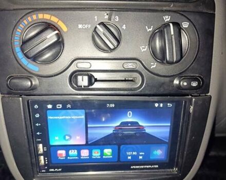 Красный Дэу Ланос, объемом двигателя 1.5 л и пробегом 257 тыс. км за 2000 $, фото 6 на Automoto.ua