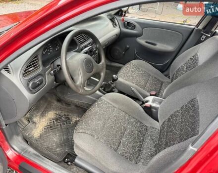 Красный Дэу Ланос, объемом двигателя 1.5 л и пробегом 135 тыс. км за 2450 $, фото 3 на Automoto.ua