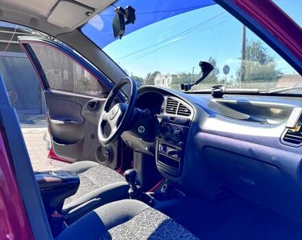 Красный Дэу Ланос, объемом двигателя 1.4 л и пробегом 112 тыс. км за 3000 $, фото 4 на Automoto.ua