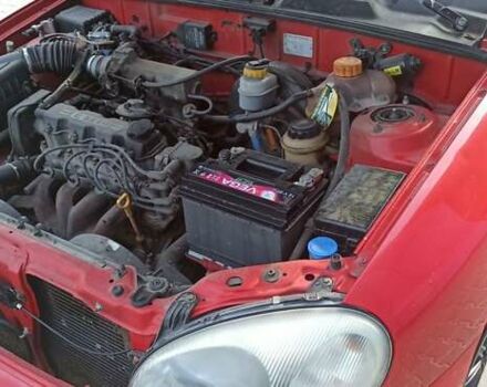 Красный Дэу Ланос, объемом двигателя 1.5 л и пробегом 437 тыс. км за 2150 $, фото 14 на Automoto.ua