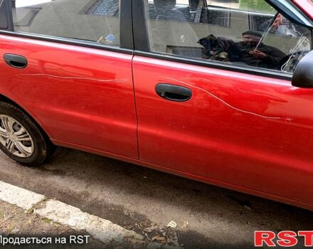 Красный Дэу Ланос, объемом двигателя 1.4 л и пробегом 81 тыс. км за 2500 $, фото 6 на Automoto.ua