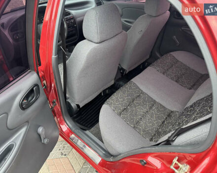 Красный Дэу Ланос, объемом двигателя 1.4 л и пробегом 44 тыс. км за 3300 $, фото 11 на Automoto.ua