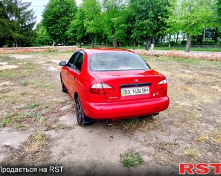 Красный Дэу Ланос, объемом двигателя 1.4 л и пробегом 176 тыс. км за 1500 $, фото 3 на Automoto.ua
