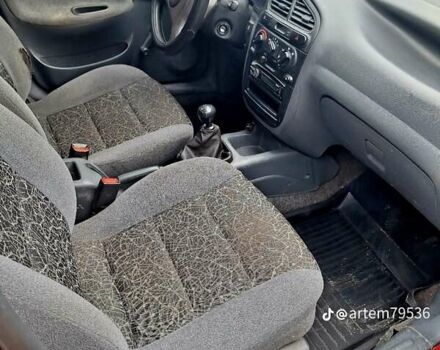 Красный Дэу Ланос, объемом двигателя 1.5 л и пробегом 113 тыс. км за 2500 $, фото 13 на Automoto.ua