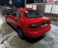 Красный Дэу Ланос, объемом двигателя 1.5 л и пробегом 257 тыс. км за 2000 $, фото 3 на Automoto.ua