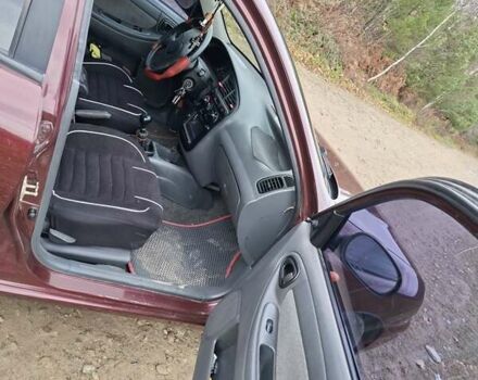 Красный Дэу Ланос, объемом двигателя 1.5 л и пробегом 211 тыс. км за 2800 $, фото 4 на Automoto.ua