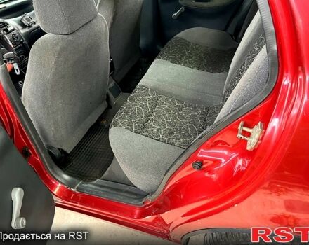 Дэу Ланос 2008 в Краснокутске на Automoto.ua Красный Дэу Ланос, объемом двигателя 1.4 л и пробегом 170 тыс. км за 1800 $, фото 5 на Automoto.ua